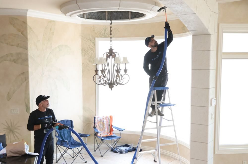 Austin Breeze technicians cleaning a home's ducts